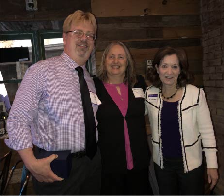 Drs. Timothy and Paula Ulrich stand with Dean Bonnie Rush