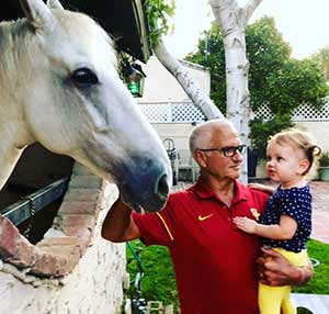 Dr. J. David Wheat and granddaughter