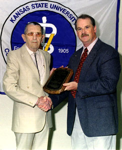 Dr. Hugh Butler receives the E.R. Frank Award