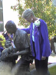 Mary Lee Kind at the Kind statue