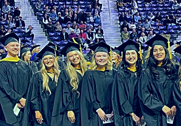 Group of One-Year Master's graduates at ceremony
