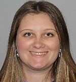 headshot photo of Reece Adams