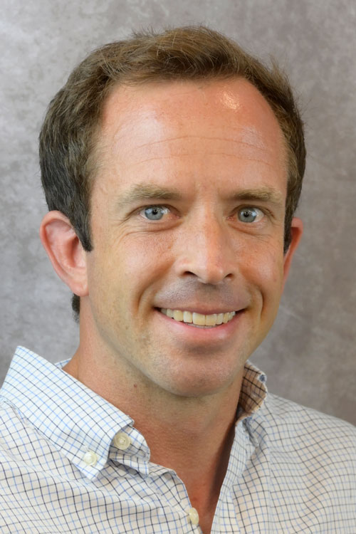 Headshot of Dr. adam bassett.