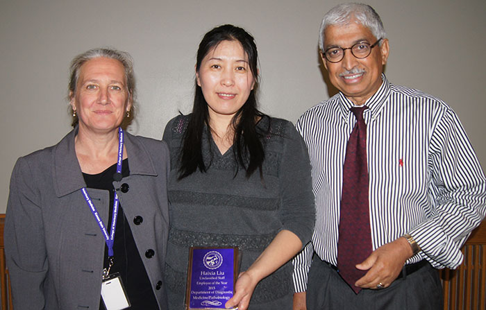 Dean Beckham, Haixia Liu and Dr. M.M. Chengappa