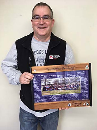 Dr. Mike Dryden with plaque