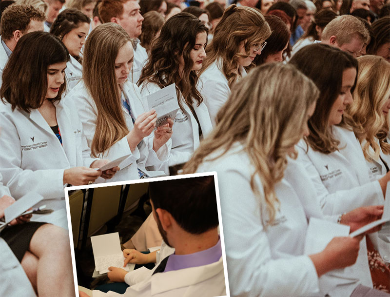 White Coat - students open cards