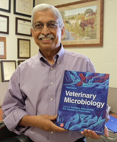 Dr. M.M. Chengappa with 'Veterinary Microbiology'