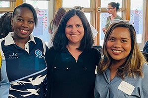 K-State Master of Public Health students Nokwanda Hlophe, left, and Toni Rose Barroga, right, attend the 2022 Riley County Community Health Improvement Plan meeting with Ellyn Mulcahy, center, director of the university's Master of Public Health Program.