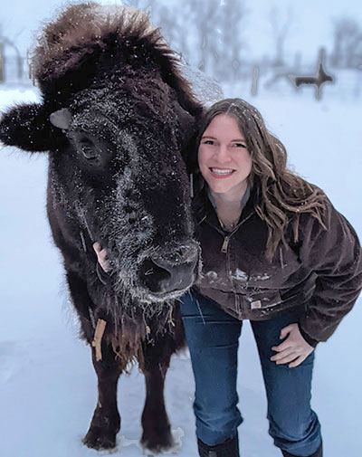 Mikayla Lacher and bison