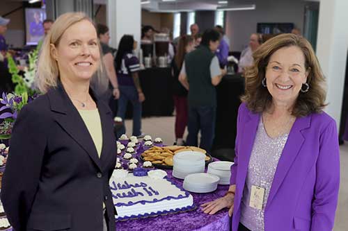 Drs. Elizabeth Davis and Bonnie Rush smile at farewell reception.