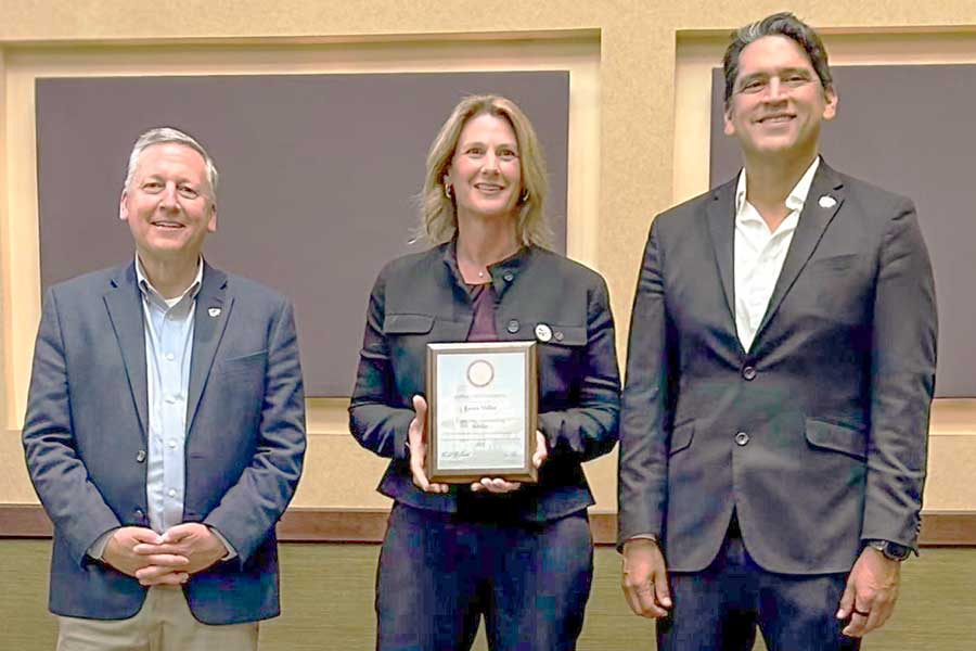 Dr. Laura Miller receives recognition at the University Outstanding Scholars Awards