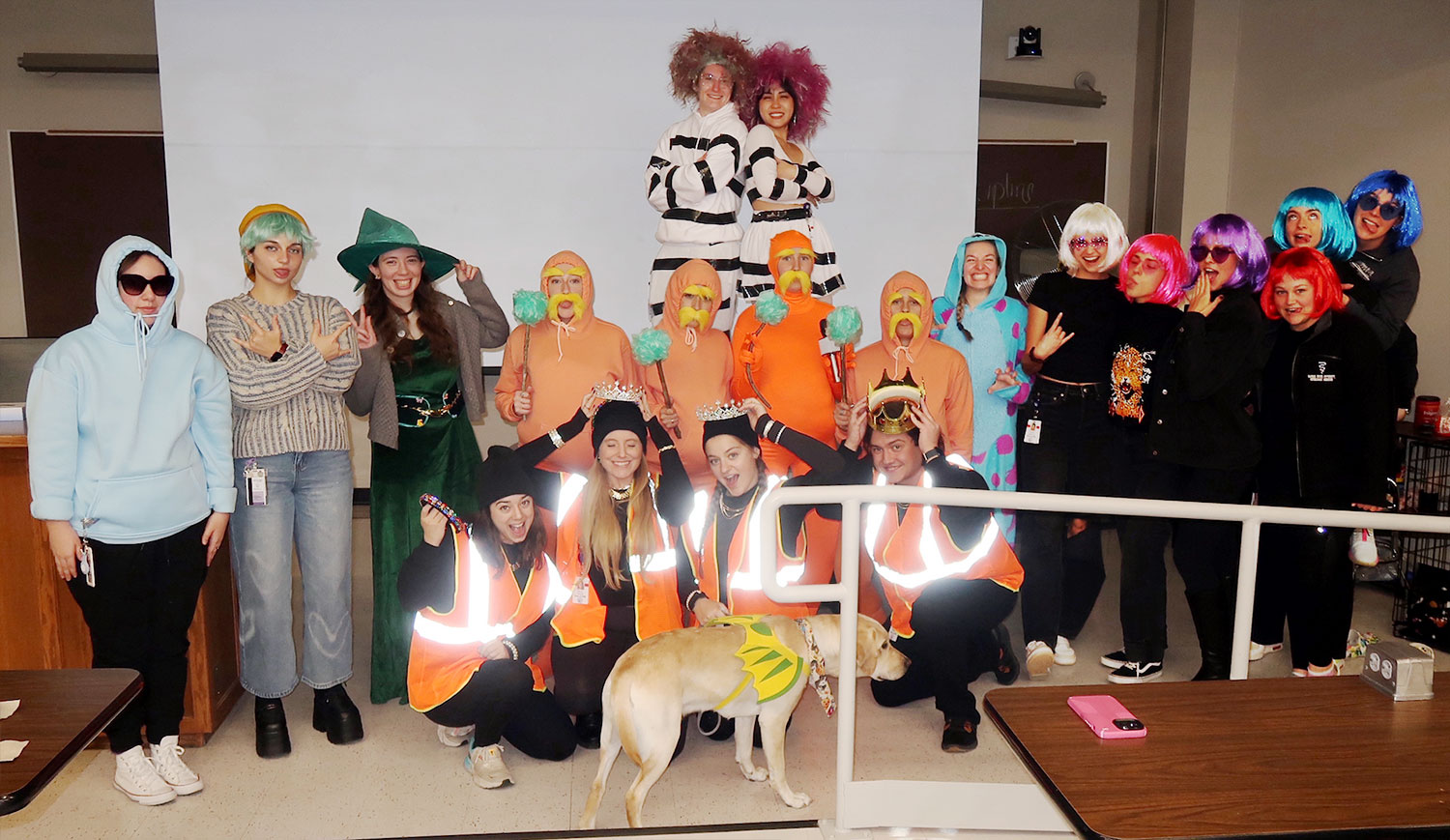 Students line up with different costumes for Halloween