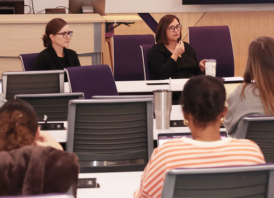 Students gather in the BI auditorium for a panel discussion on the Human Animal Bond
