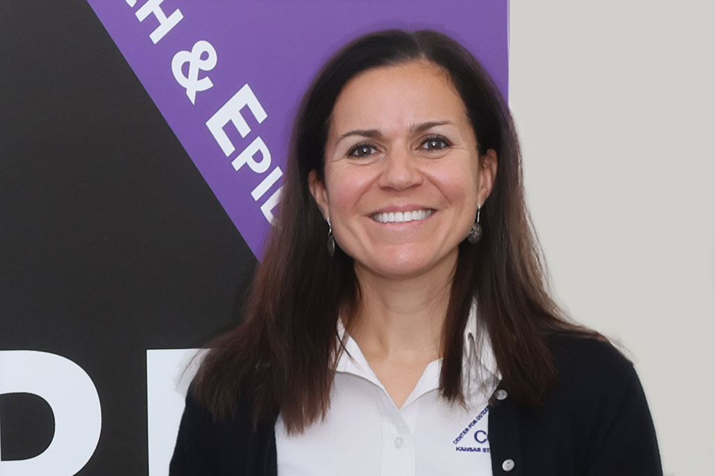 Dr. Natalia Cernicchiaro in front of the CORE sign