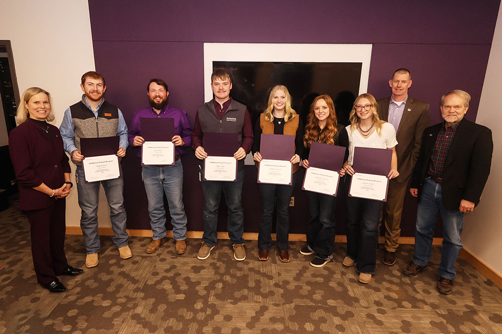 Group picture of six student and three faculty members