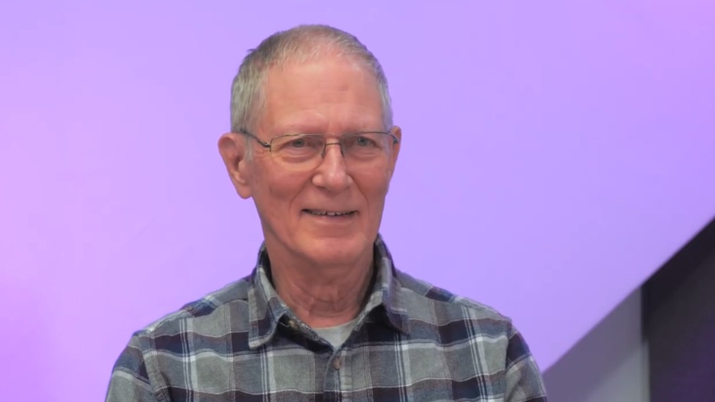 Dr. Edward Epp sitting for video interviews