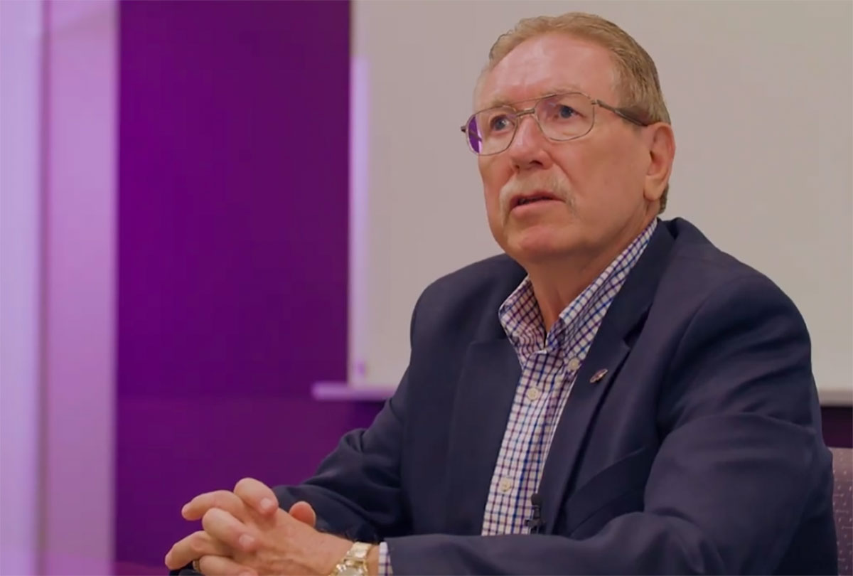 Dr. Dennis Hausmann sits for an interview