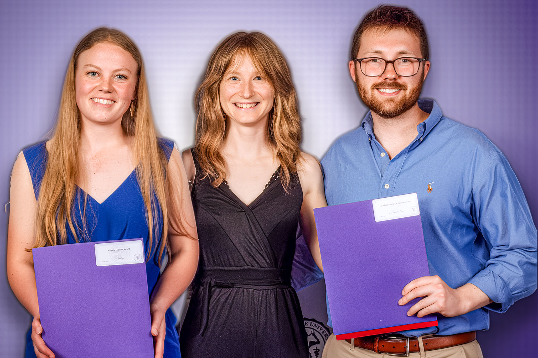Three former veterinary students who received an ACVIM certificate