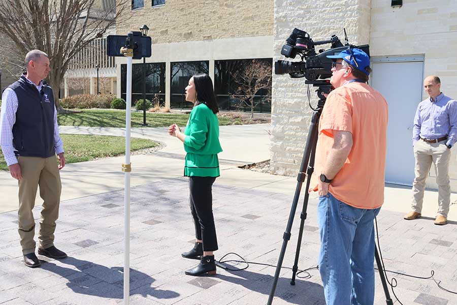 Dr. White meets with a reporter from Kansas City