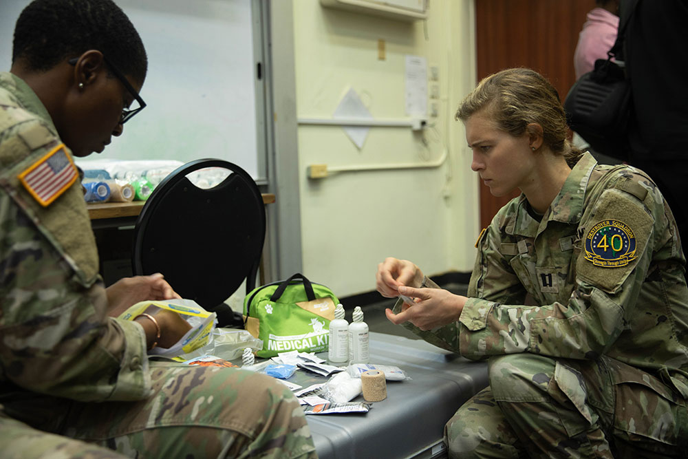 Capt. Jackson preparing first aid items during a class.