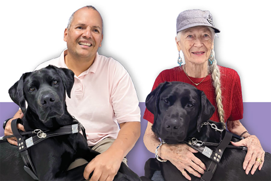 Two people pose with their assistance dogs that were trained at K-State.