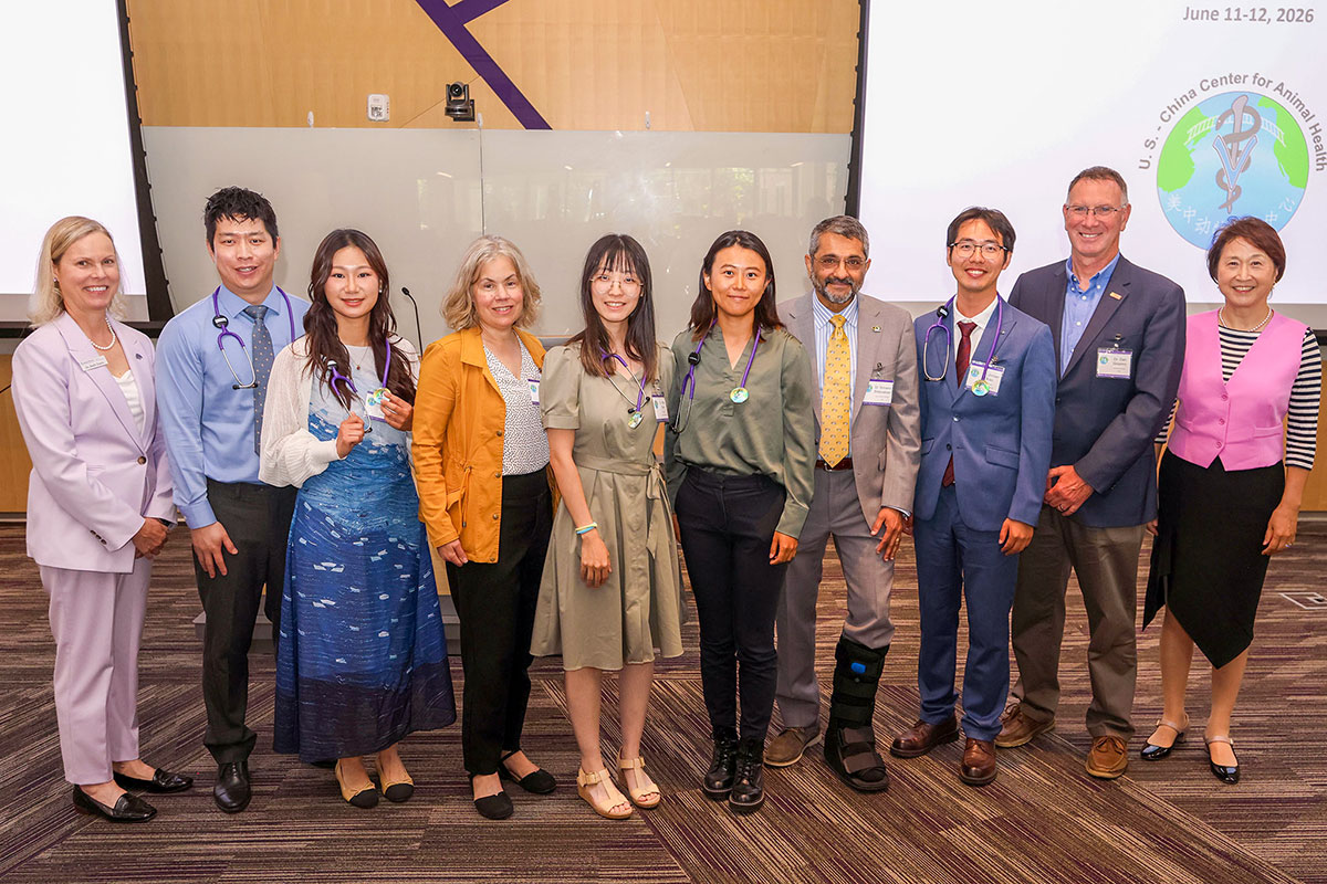 Group of deans and graduates in the US-China Joint DVM program